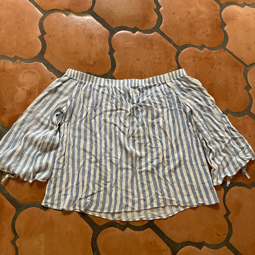 very cute blue and white off the shoulder shirt